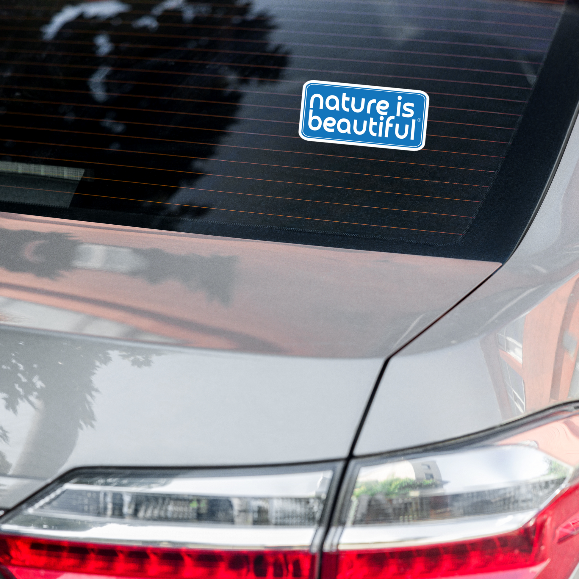 Nature Is Beautiful® Vinyl Bumper Sticker – White Logo on Blue, Bubble‑Free Eco‑Durable Decal